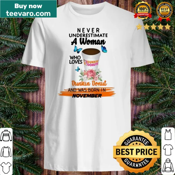 Floral shirt stating never underestimate a donut-loving November woman