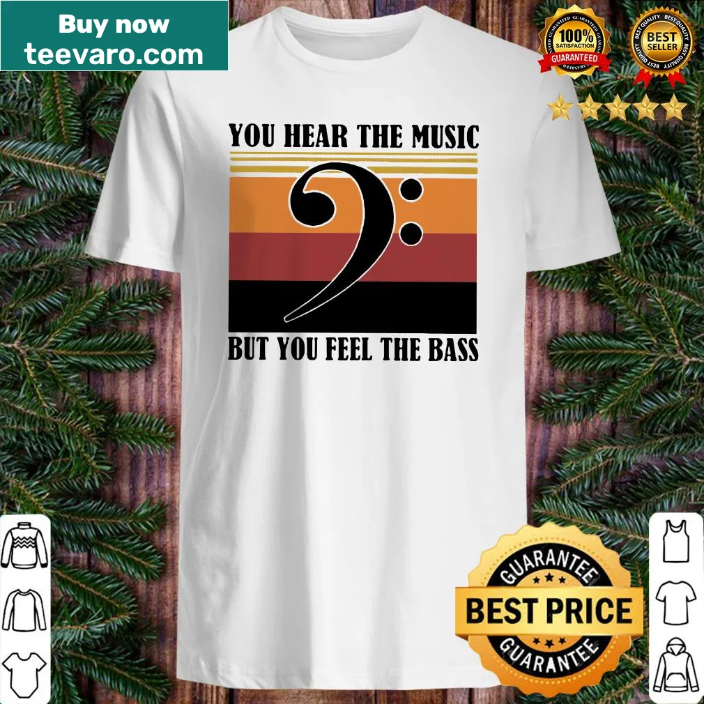 Vintage-style shirt with musical notes and text about feeling the bass
