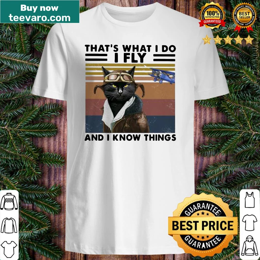 Vintage-style shirt with the phrase 'That’s what I do I fly and I know things' featuring a black cat