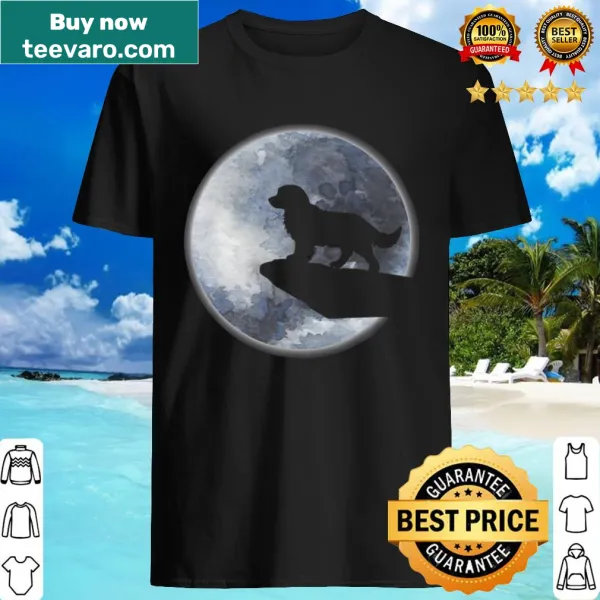 Silhouette of a golden retriever puppy with moon graphic