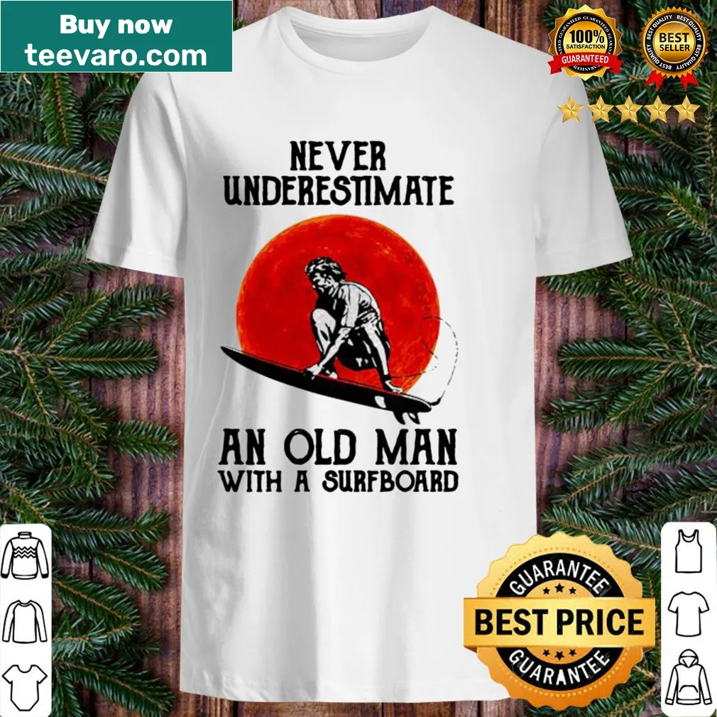 Vintage-style shirt with sunset and surfboard graphic