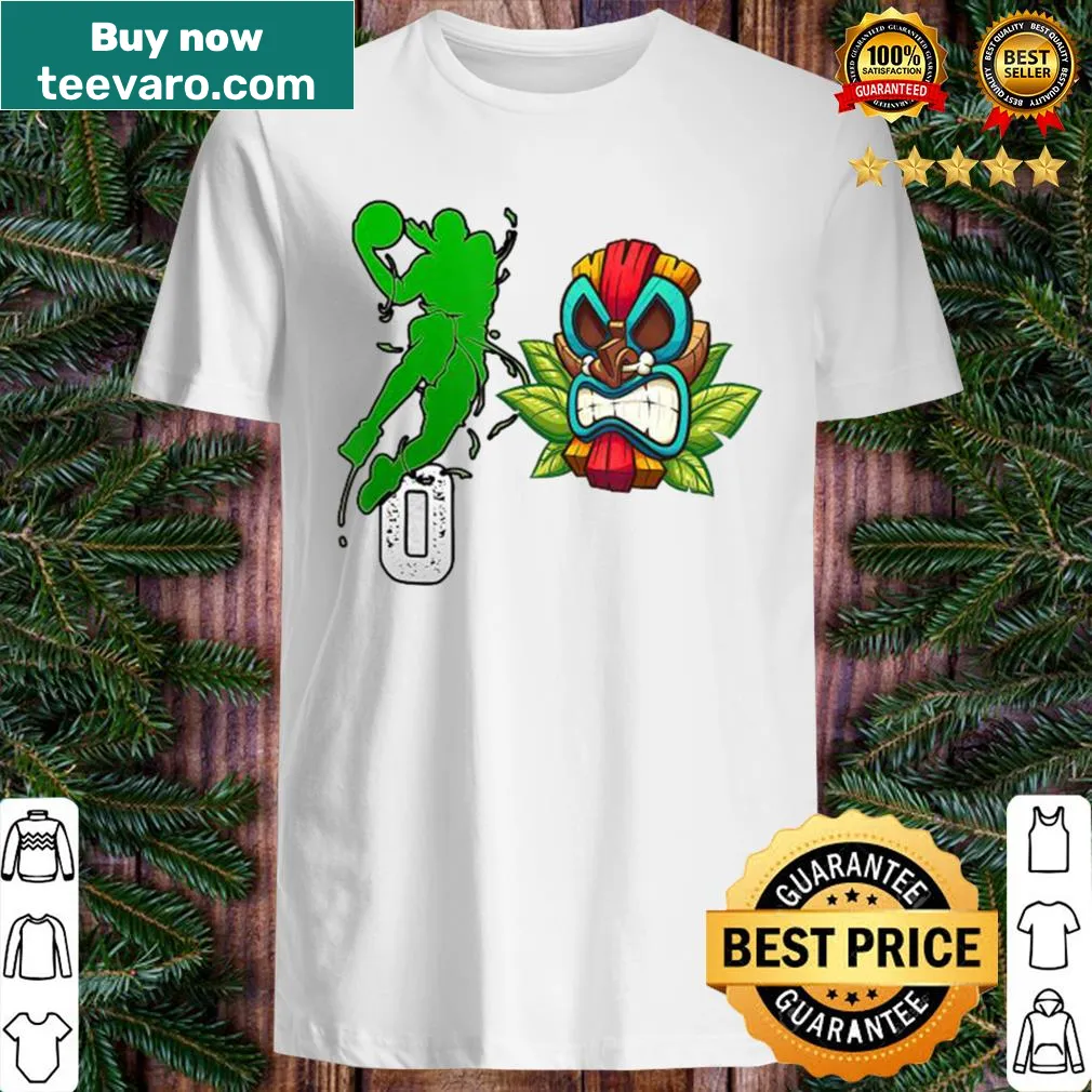 Vintage Halloween shirt featuring a tiki mask and Celtics theme