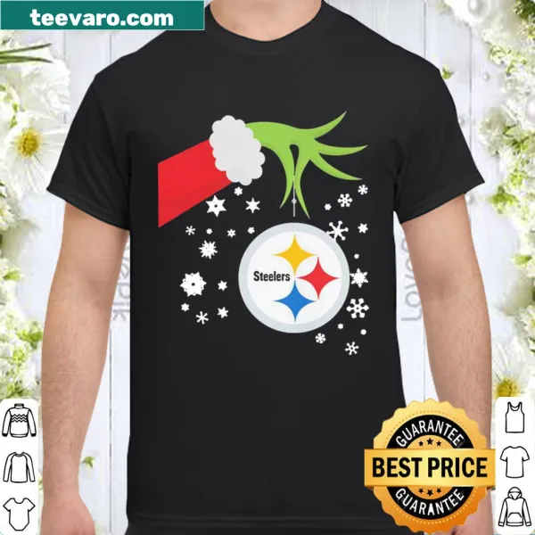 The Grinch holding a Steelers ornament for Christmas fans