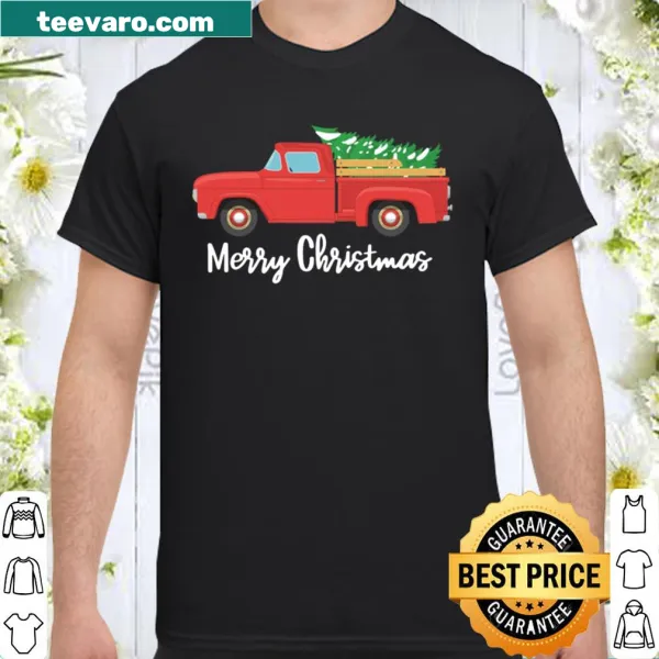 Vintage red wagon shirt carrying a Christmas tree