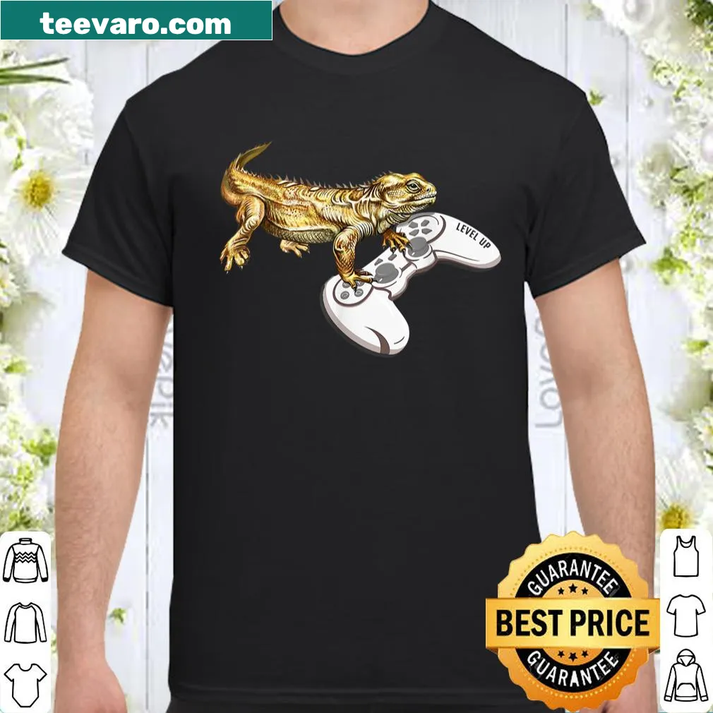 Bearded dragon holding a video game controller in a playful design