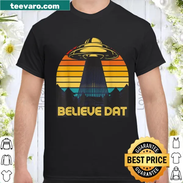 Vintage-style shirt with alien spaceship and sunset graphic