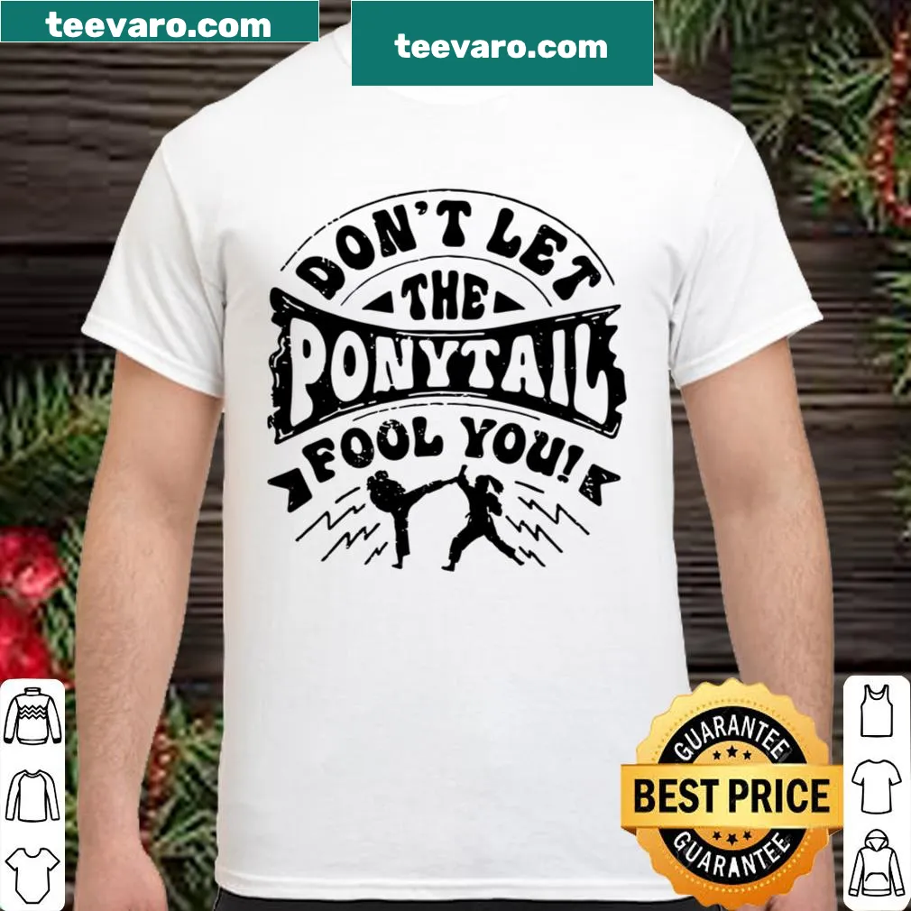 Shirt featuring a karate girl design with a ponytail and motivational text
