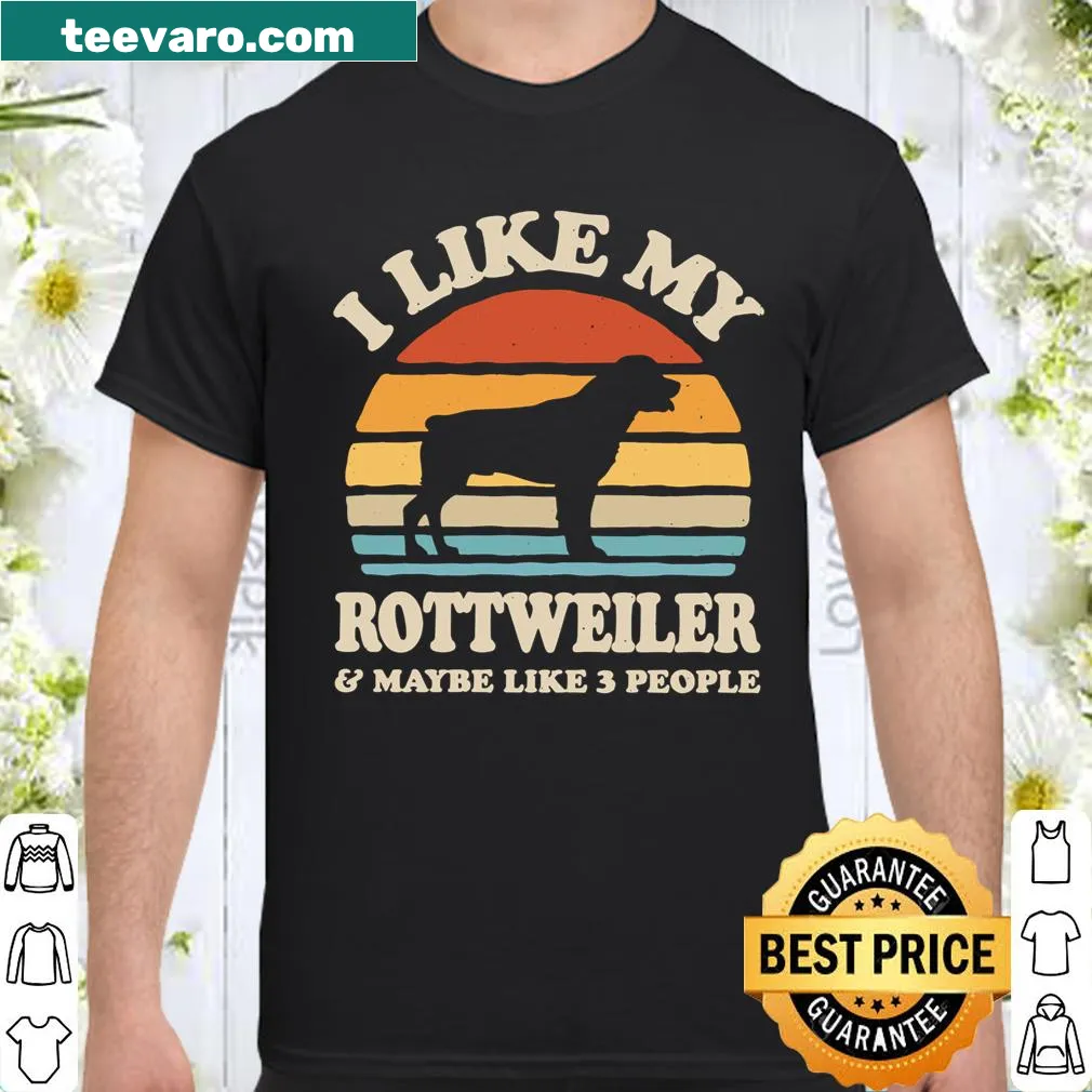 Retro-style Rottweiler shirt with sunset graphic