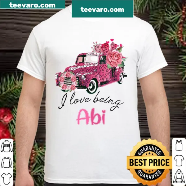 Pink truck with flowers and the text 'I Love Being Abi'