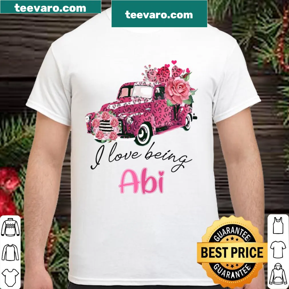 Pink truck with flowers and the text 'I Love Being Abi'