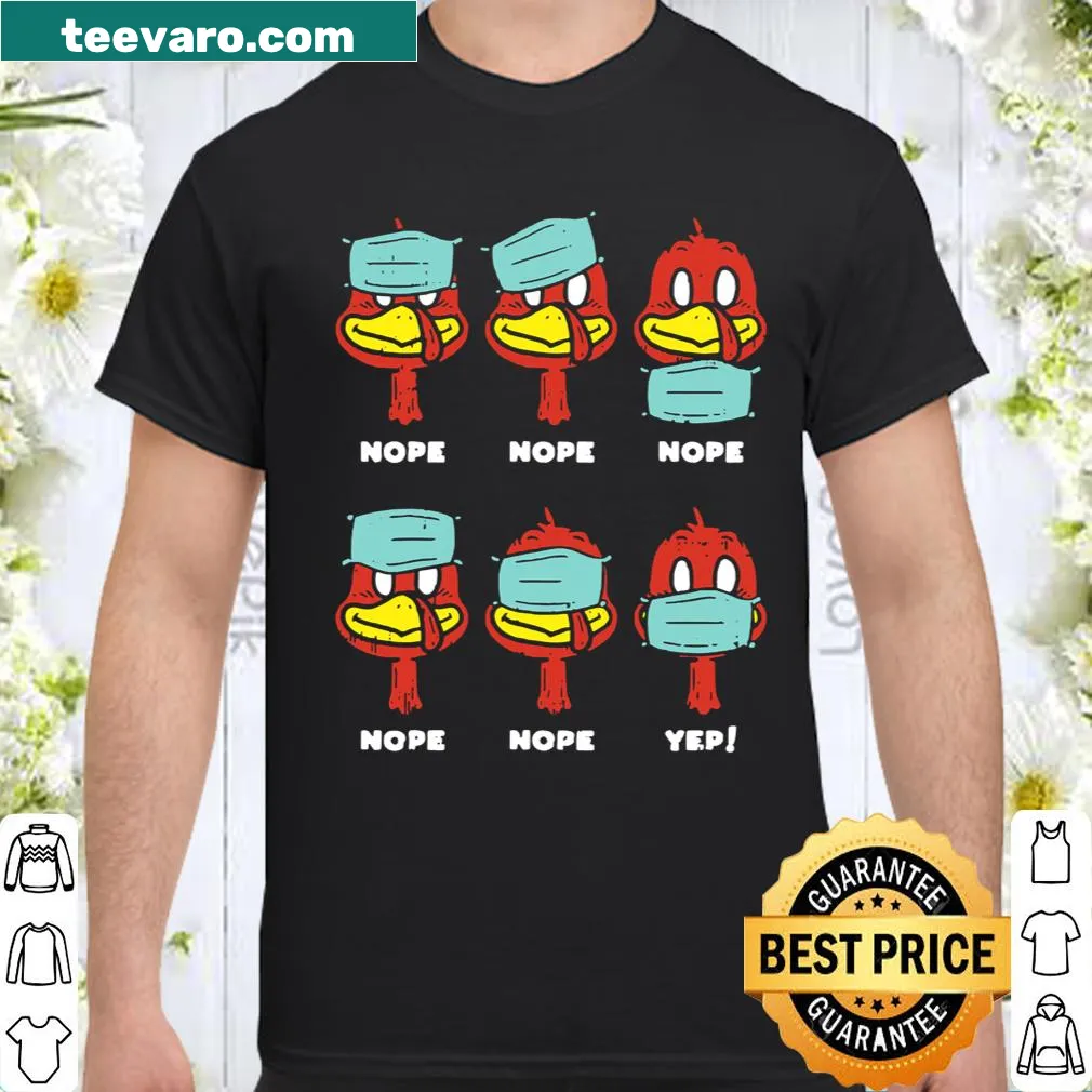 Funny turkey wearing a face mask on a Thanksgiving shirt