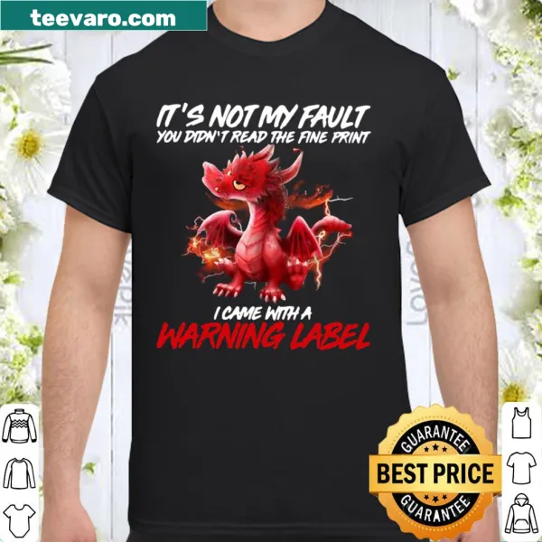 Shirt featuring a humorous dragon warning label graphic.