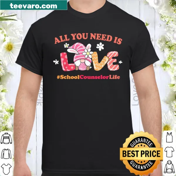 Shirt with a whimsical gnome and the phrase 'All You Need Is Love'