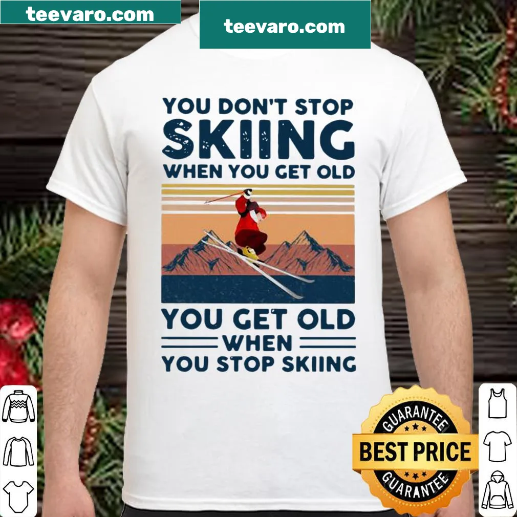 Vintage ski-themed shirt with humorous text about aging and skiing