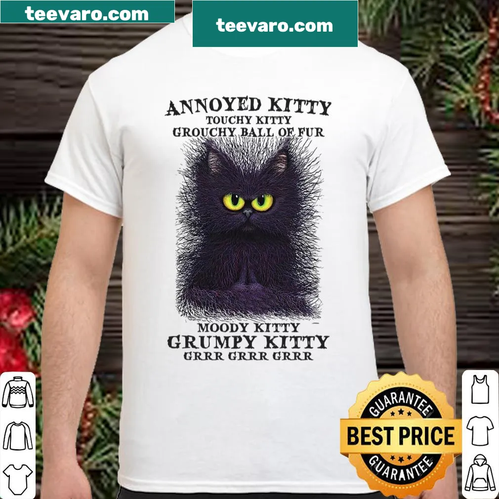 Cartoonish design featuring annoyed and moody cats on a shirt.