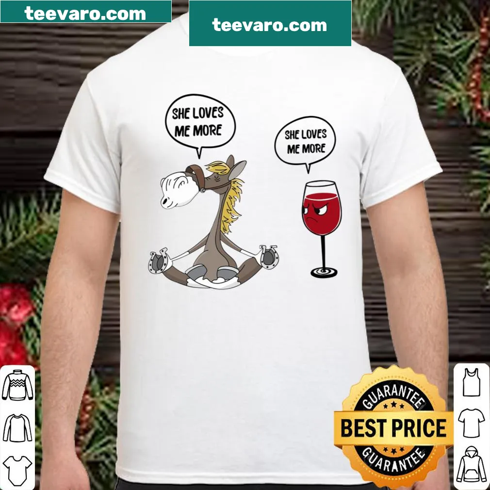Shirt featuring the phrase 'She Loves Me More' in heartfelt typography