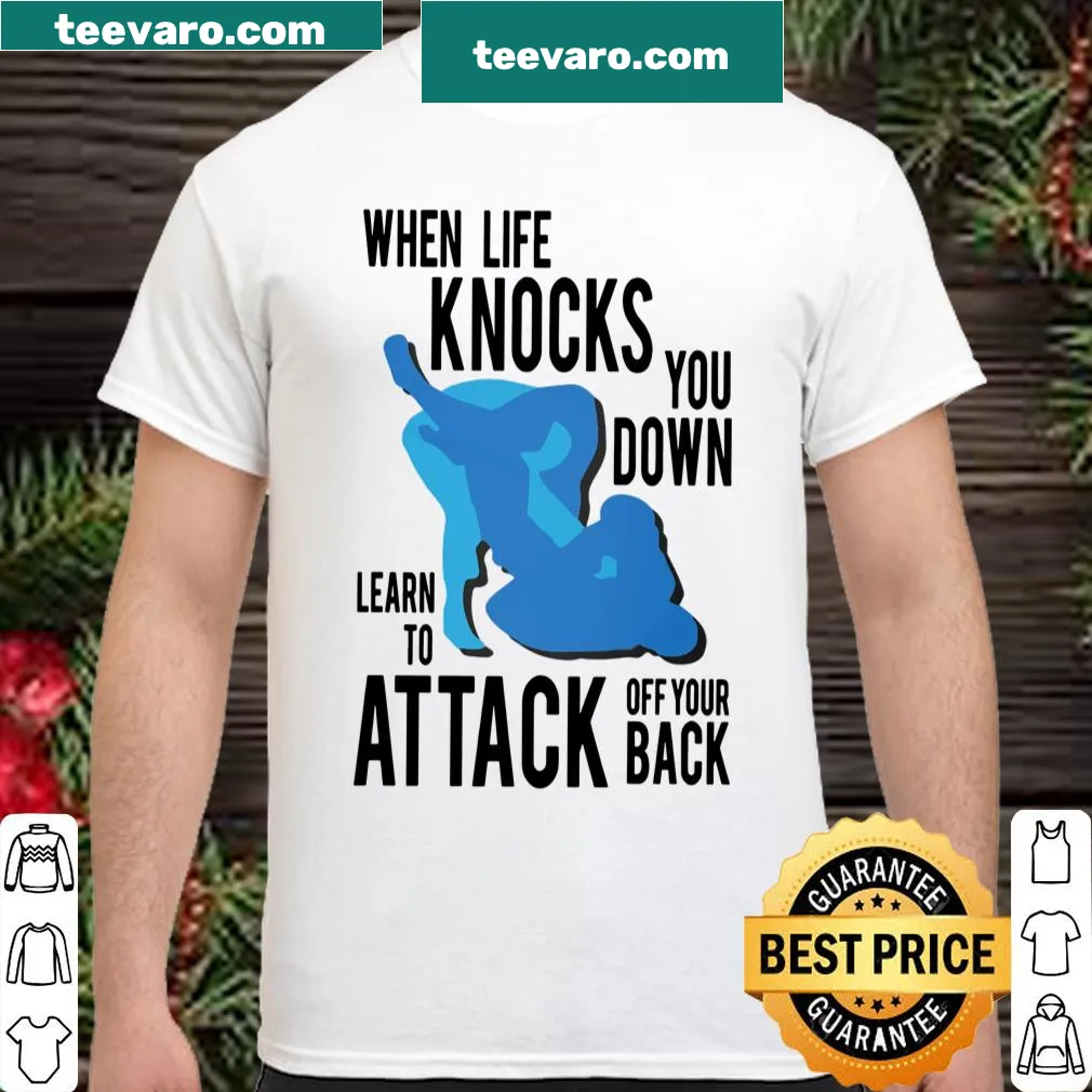 Motivational shirt with the phrase 'When Life Knocks You Down Learn To Attack Off Your Back'