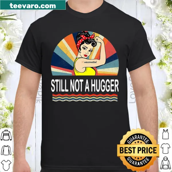 Humorous vaccination shirt stating 'Still Not A Hugger.'