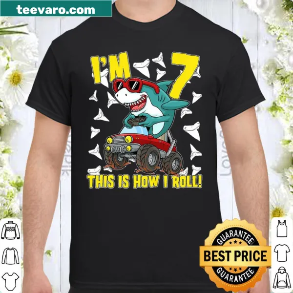 Shirt for 7-year-old featuring a monster truck and shark design.
