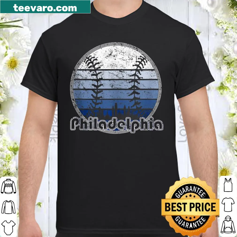 Vintage baseball shirt with Philadelphia skyline and sunset design.