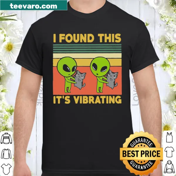 Vintage-style t-shirt with a cute alien and a cat graphic