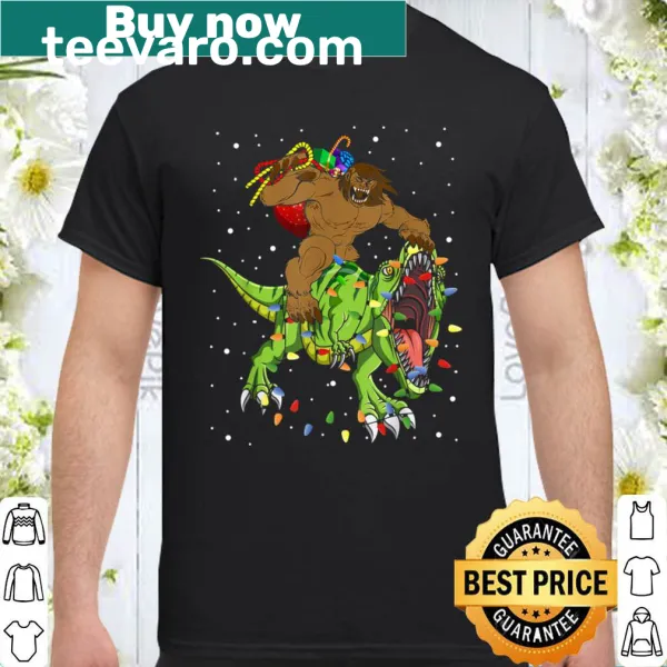 Cartoon design of Bigfoot riding a T-Rex with Christmas lights