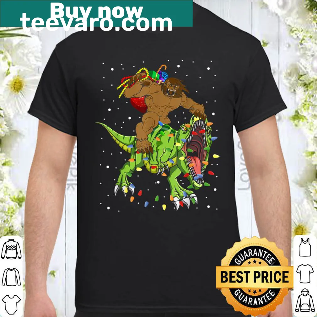 Cartoon design of Bigfoot riding a T-Rex with Christmas lights