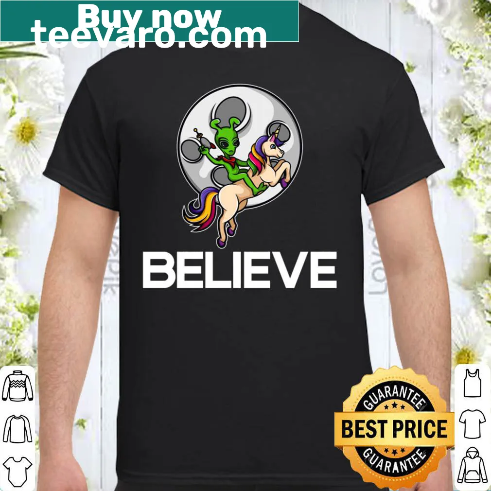 Funny cartoon shirt with an alien riding a unicorn design.
