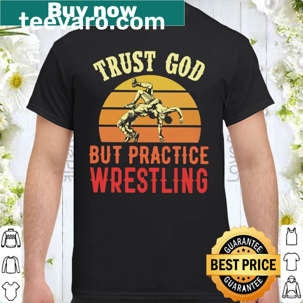 Text 'Trust God But Practice Wrestling' on a shirt