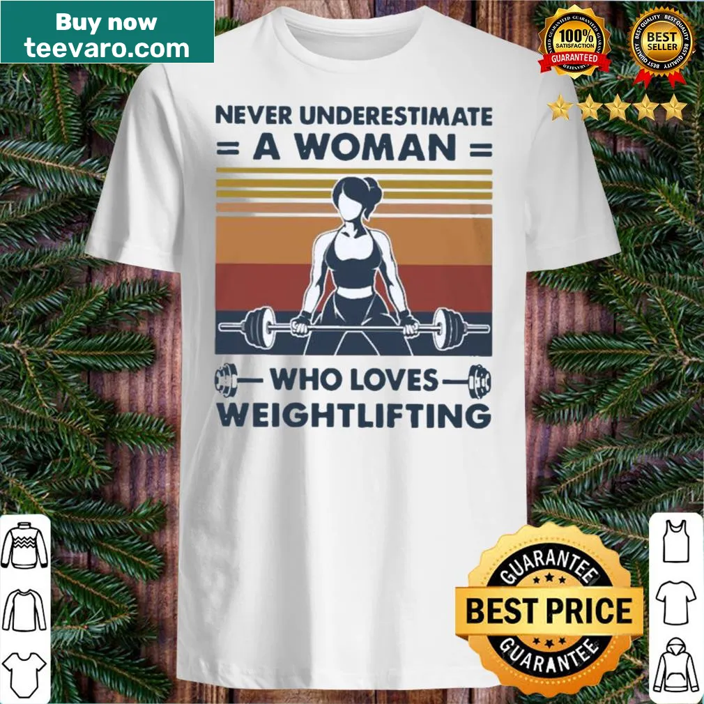 Vintage-style shirt emphasizing women's strength and love for weightlifting with bold text.