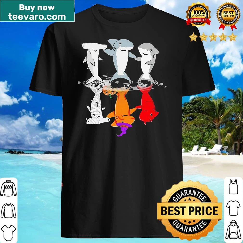 Playful cartoon sharks upside down on a Halloween T-shirt