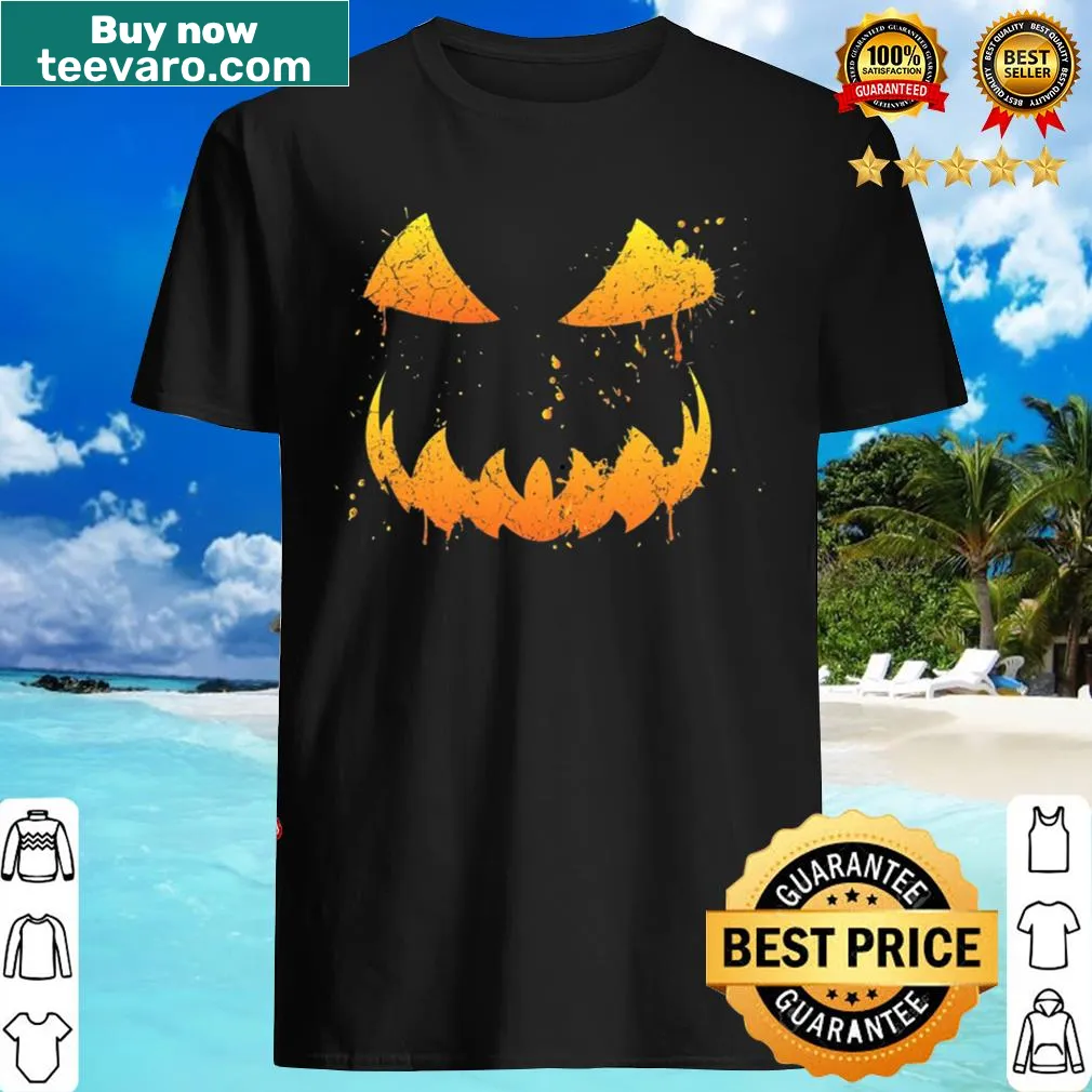 Halloween T-shirt featuring a scary pumpkin face design