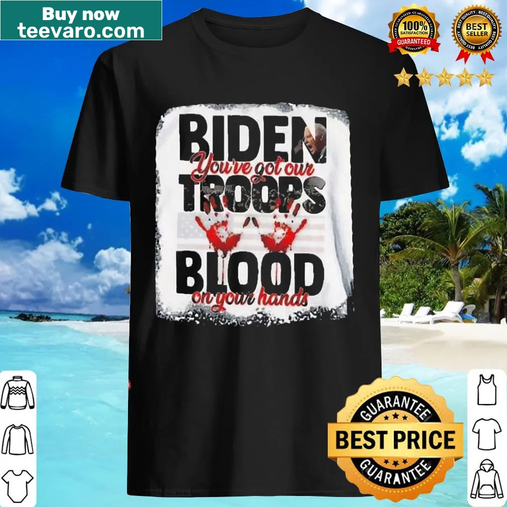 Distressed American flag with bold text about Biden and troops' blood