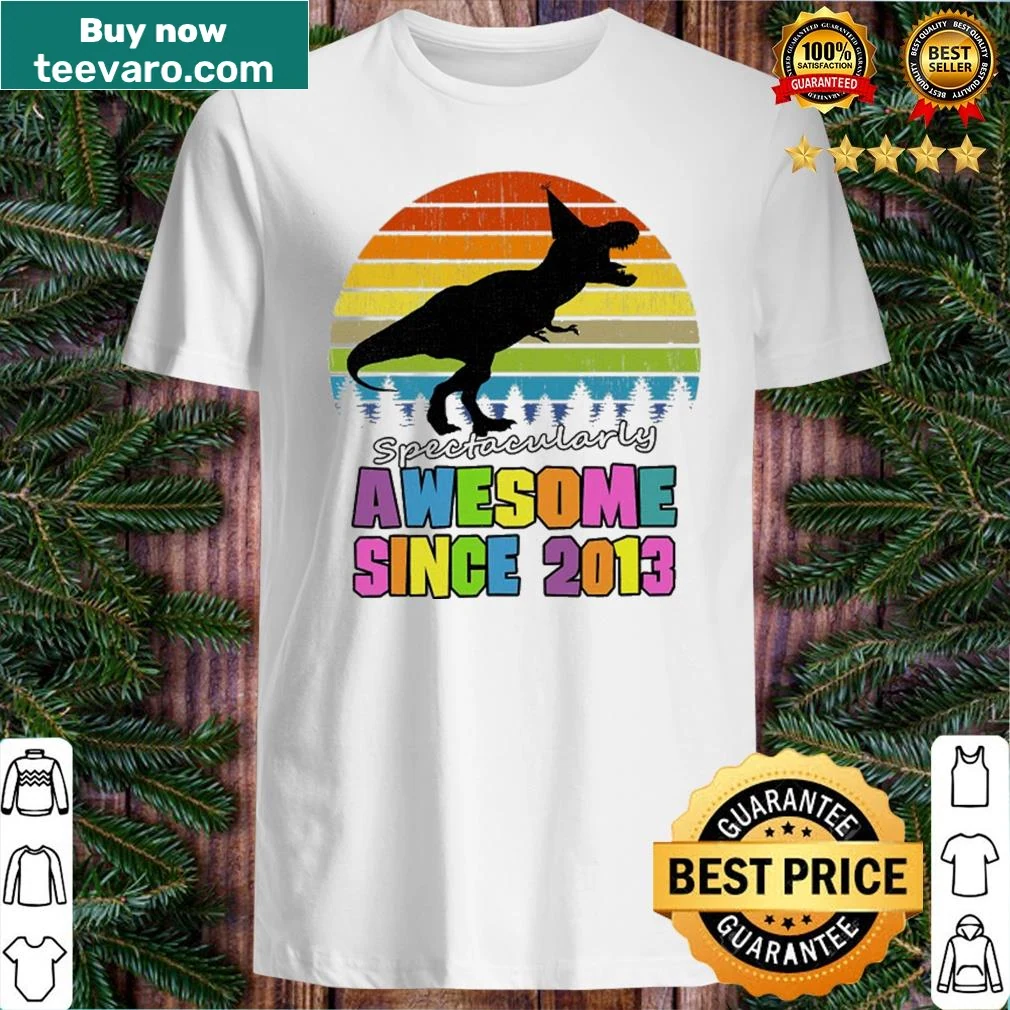 Shirt featuring a dinosaur graphic and 'Awesome Since 2013' text