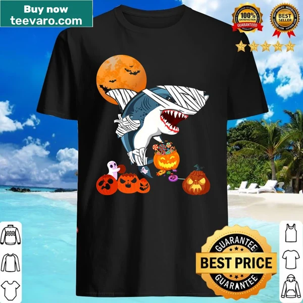 Shark cartoon holding a pumpkin full of candy for Halloween