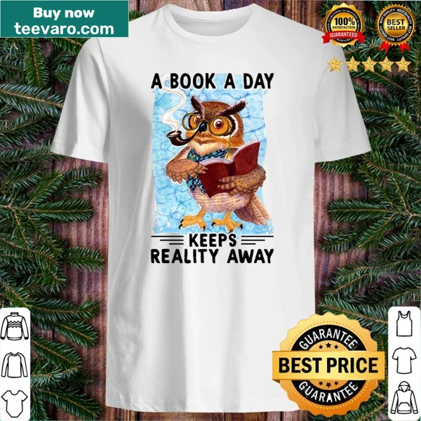 Vintage-style shirt featuring an owl on a stack of books with the saying 'A Book A Day Keeps Reality Away'