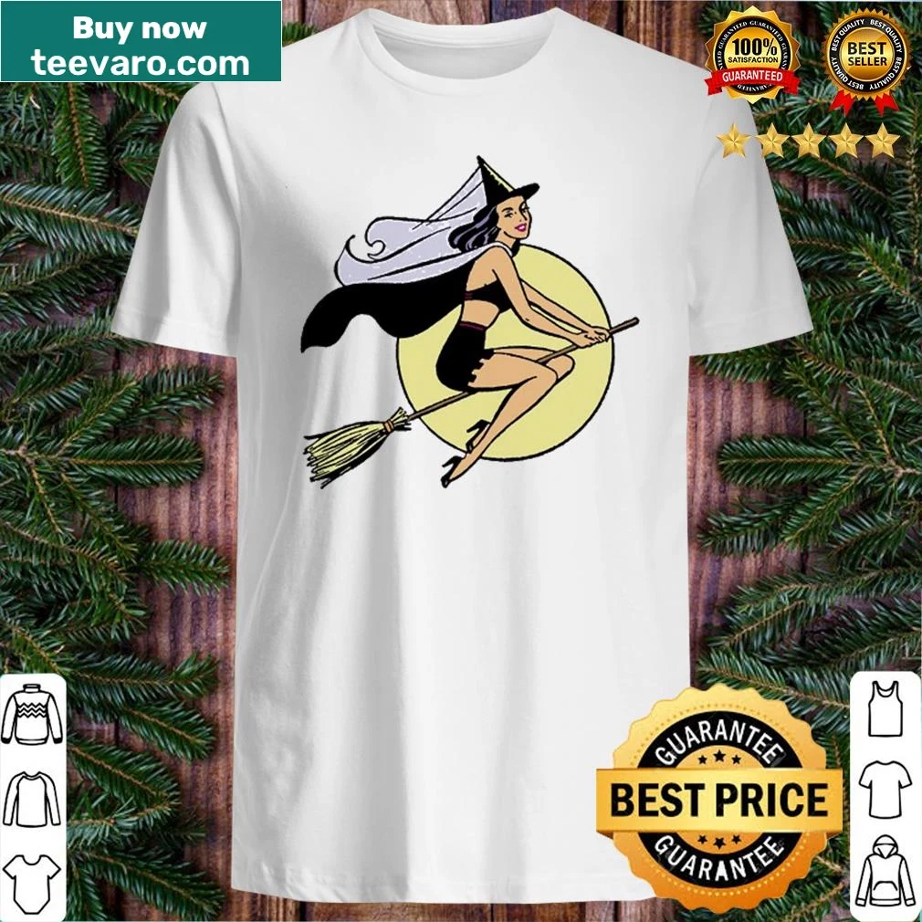 Vintage shirt featuring a witch with a broomstick for Halloween.