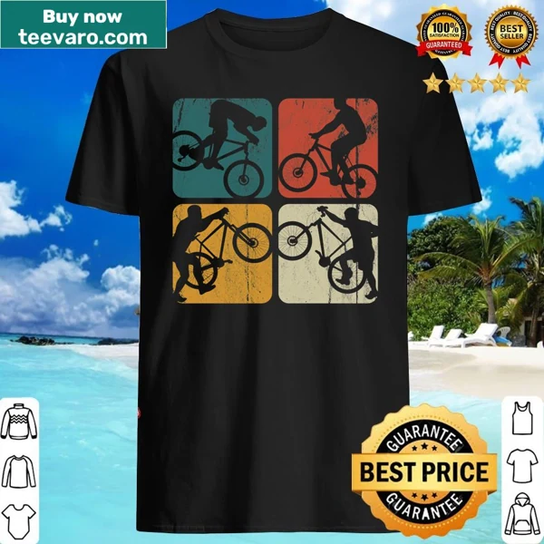 Shirt featuring a bicycle graphic and cycling-themed text.