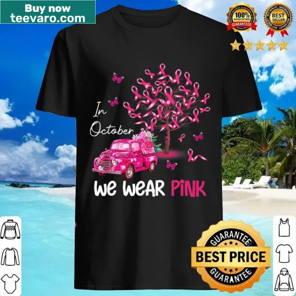 T-shirt featuring a truck with pumpkins and pink accents for Breast Cancer Awareness.