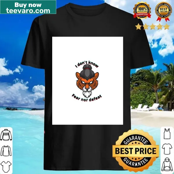 Shirt featuring bold text about fear and defeat with tiger imagery