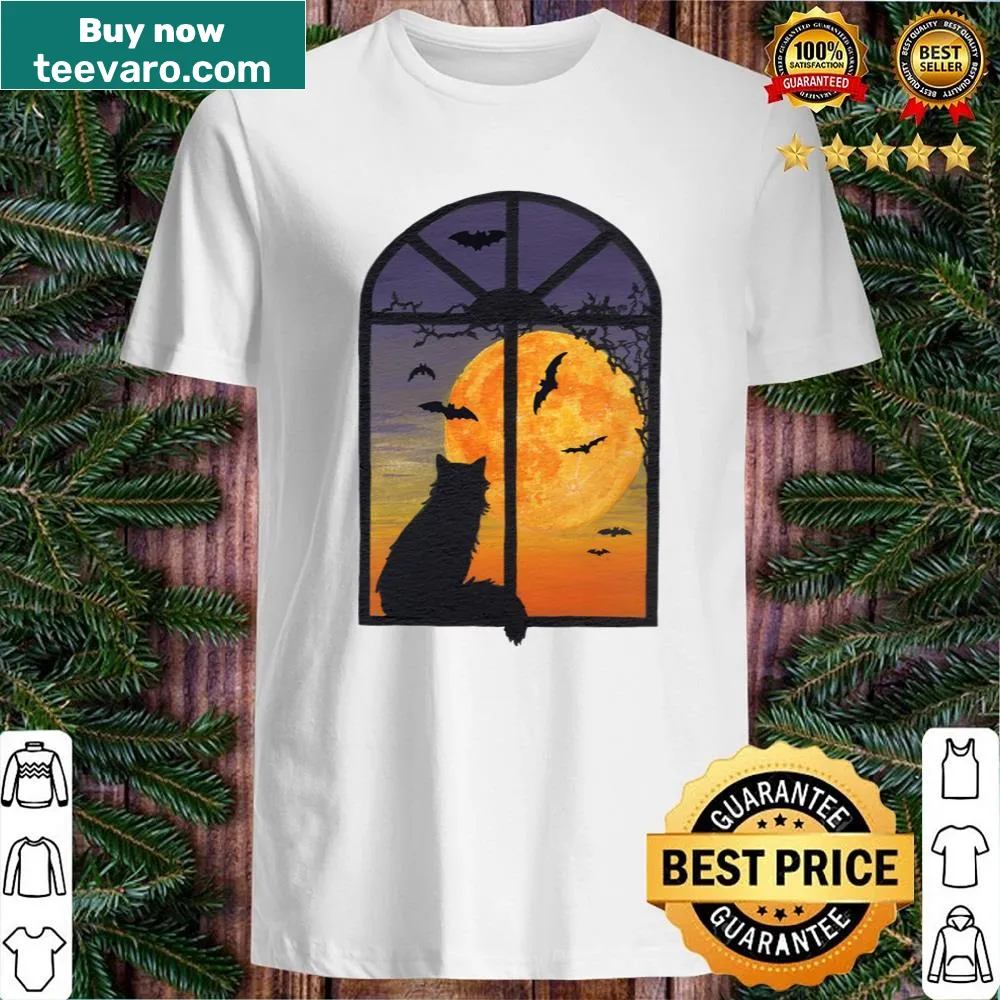 Cute Halloween-themed shirt featuring a cat looking out a window