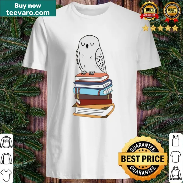 Shirt featuring a magical owl on books