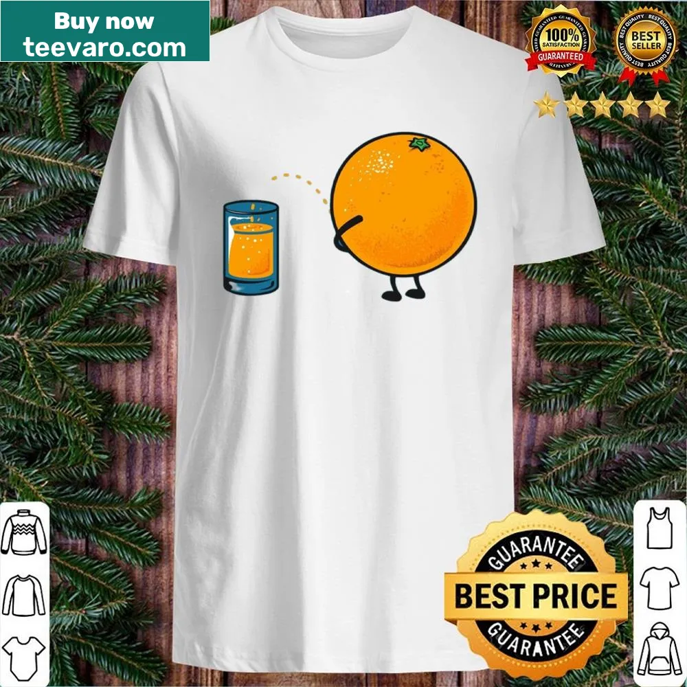 Cheerful graphic t-shirt featuring an illustration of orange juice.