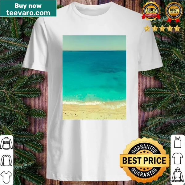 Ocean-themed shirt featuring foamy waves and beach design