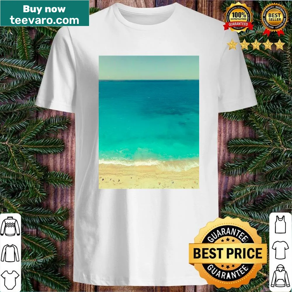 Ocean-themed shirt featuring foamy waves and beach design