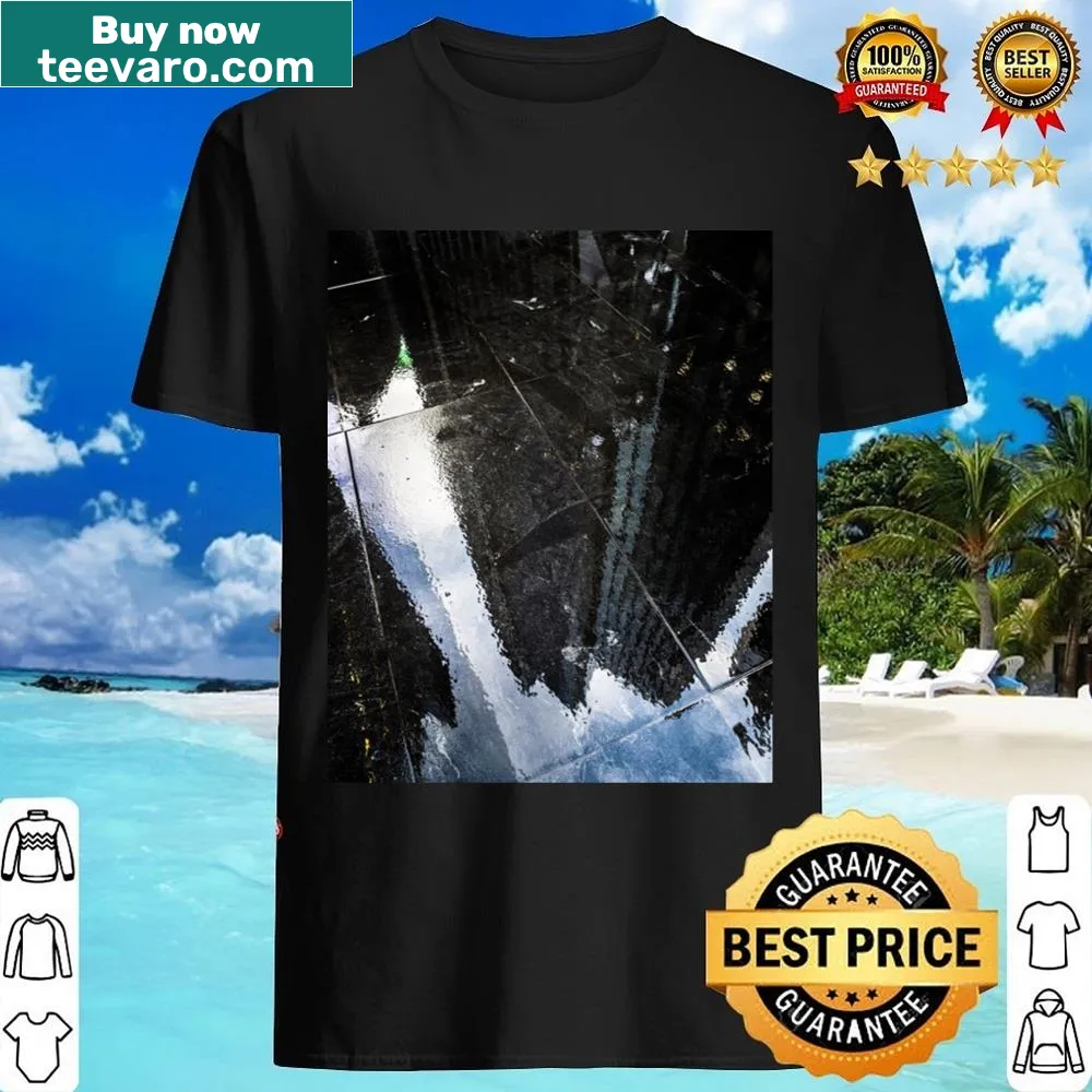 Minimalist graphic shirt featuring city reflections.
