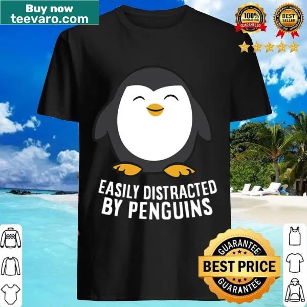 Text on shirt humorously stating distraction by cute penguins