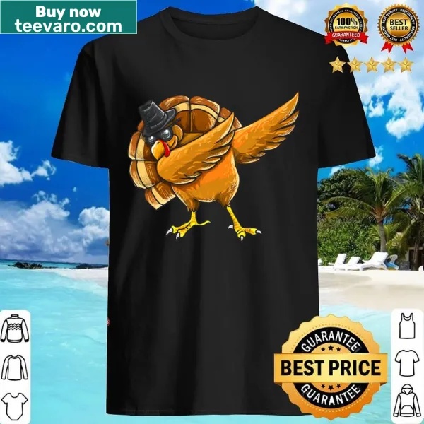 Dabbing turkey graphic t-shirt designed for kids celebrating Thanksgiving.