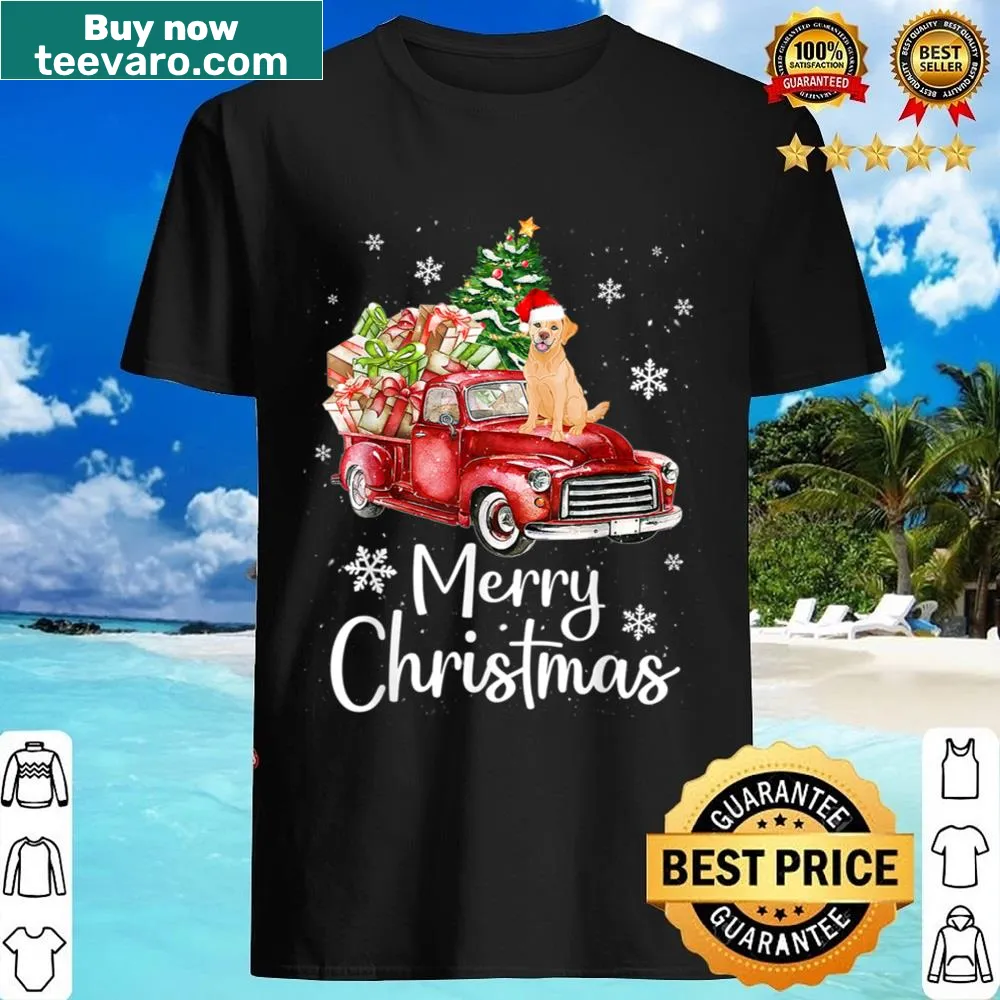 Golden Retriever riding in a truck with Christmas tree shirt