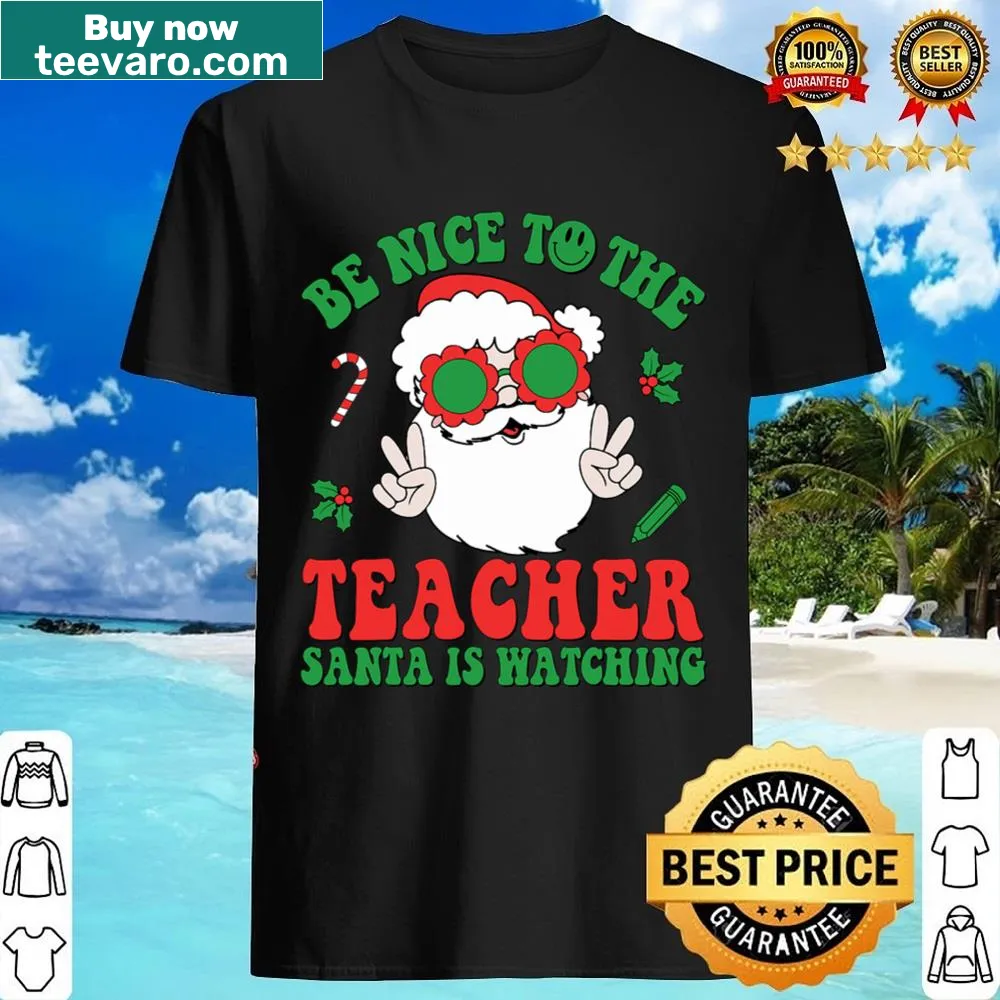Groovy Christmas shirt featuring Santa and elves in pajamas